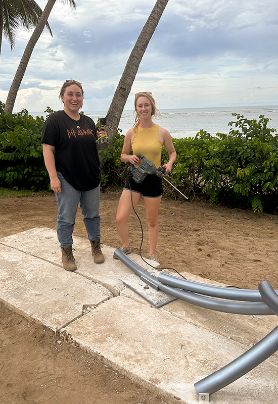 Danielle and Elizabeth prepare to install the base of the sculpture.