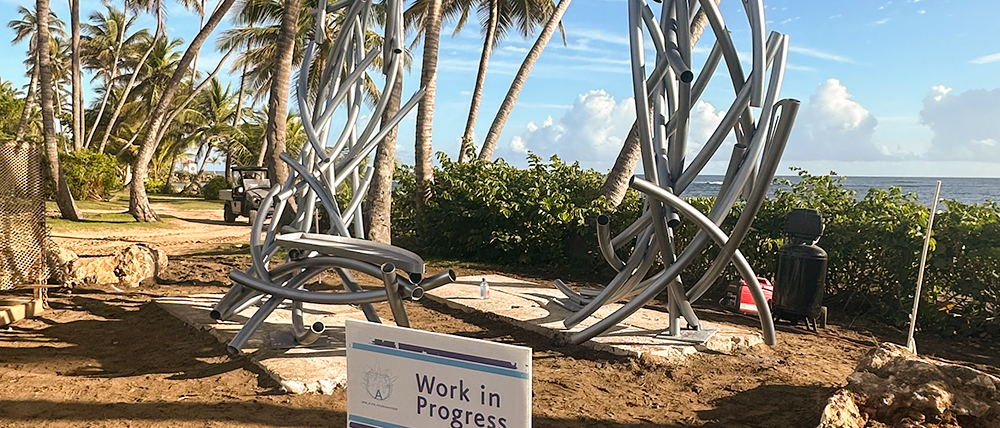 Work in Process sign in front of the sculpture at Dorado Beach.