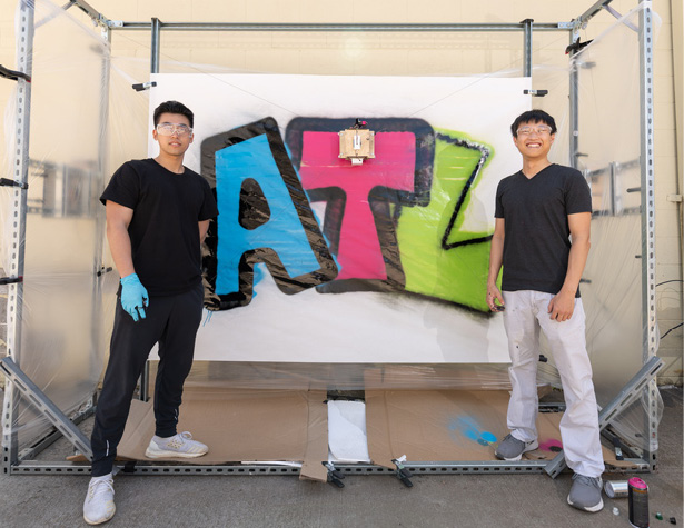 students with their robotic graffiti project