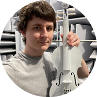student with 3D printed violin