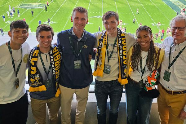 Dick Bergmark (right) and students