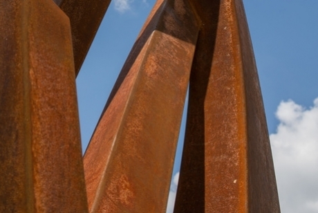 Weathered Steel spikes reaching up and out at different intervals and angles
