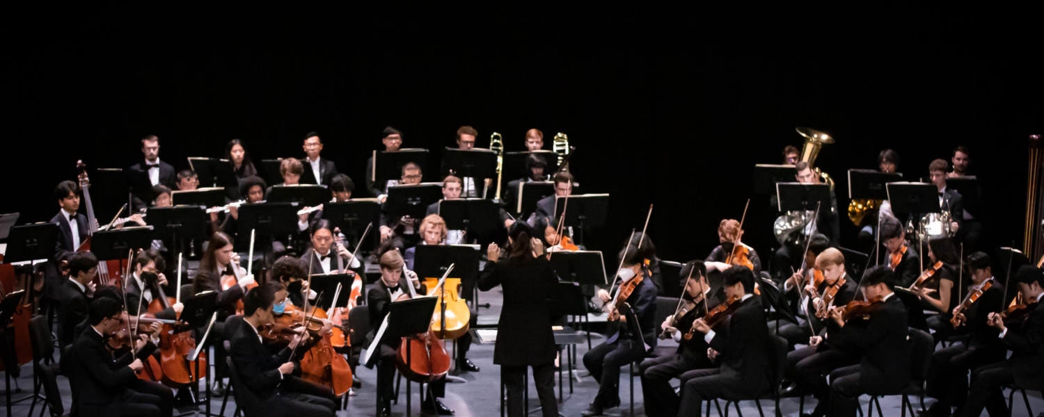 People playing musical instruments on stage