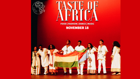 A group of performers stand on a stage in front of a red background. Taste Of Africa November 18 Georgia Tech Ferst Theater.