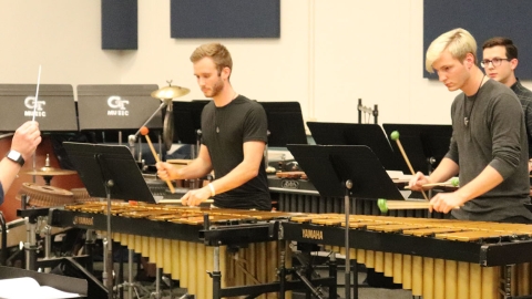 Members of the Georgia Tech Percussion Ensembles practice under the direction of Chris Moore. 