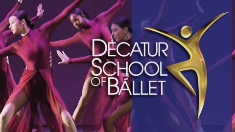 Dancers wearing red costumes with decatur school of ballet logo