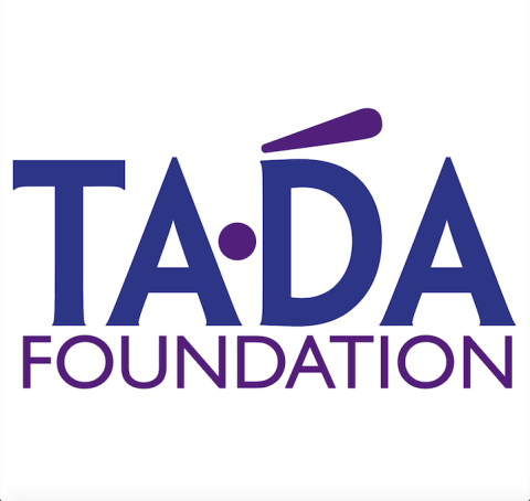 In big bold typeface, the letters TA and DA separated by a dot, and the word FOUNDATION below it
