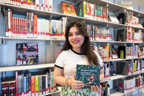 Shamim Shoomalim with her book, 'Between Classes.'