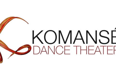 Komansé Dance Theater's Logo, made up of a flowy red, orange, and yellow brush stroke letter "K"  on the left hand side, and of the dance company's name in all uppercase letters to the right, "Komansé" being in black on top of the red "Dance Theater" letters.