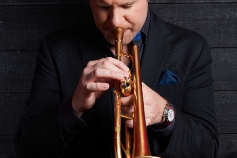 Person playing trumpet