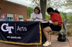 Students sitting at a table making art. Plant and Paint with Georgia Tech Health Initiatives